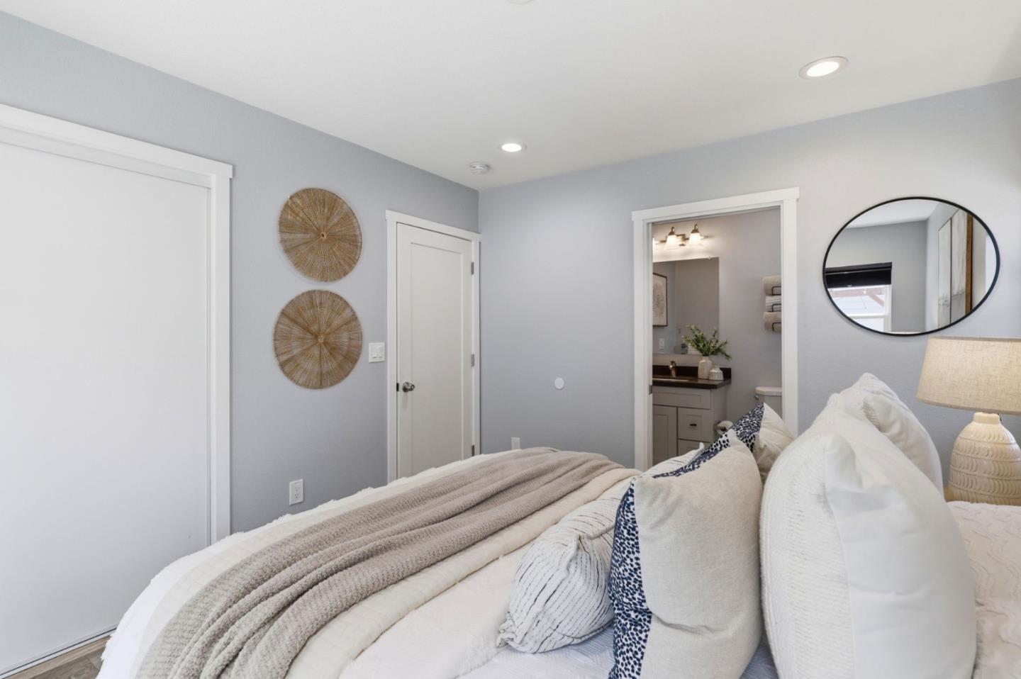 140 Second Street Gilroy, CA 95020 - Photo 24 of 33 a bedroom with a bed and a mirror
