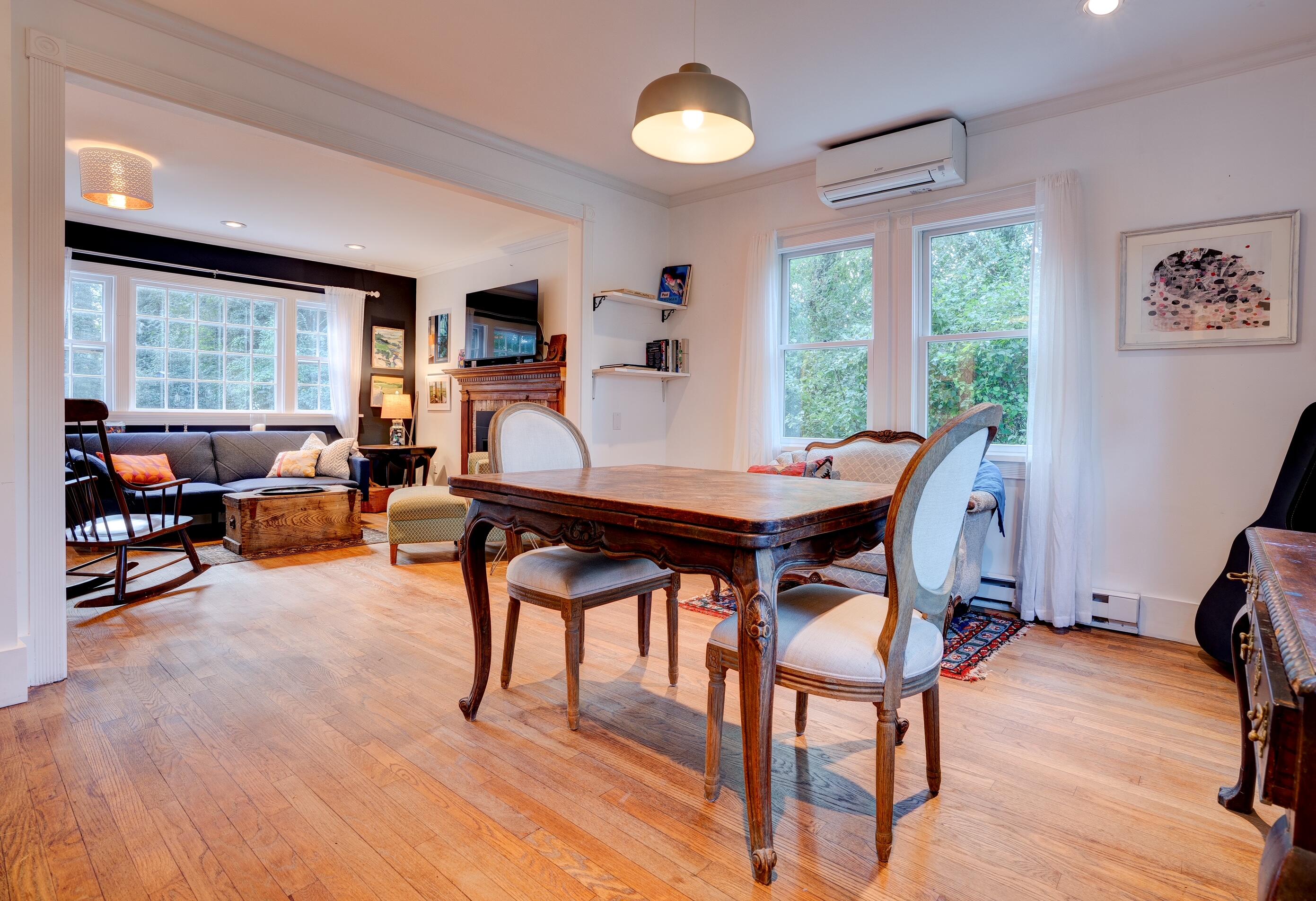 9 Locust Road Orleans, MA 02653 - Photo 19 of 41 a dining room with furniture and a wooden floor