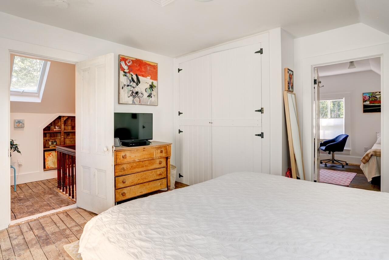 9 Locust Road Orleans, MA 02653 - Photo 26 of 41 a bedroom with a bed and furniture