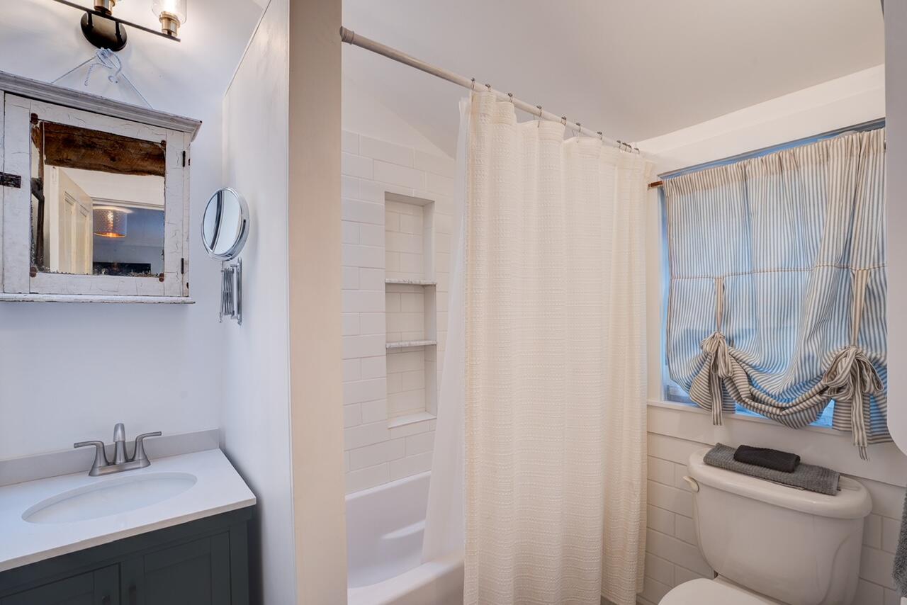 9 Locust Road Orleans, MA 02653 - Photo 30 of 41 a bathroom with a sink a toilet and shower