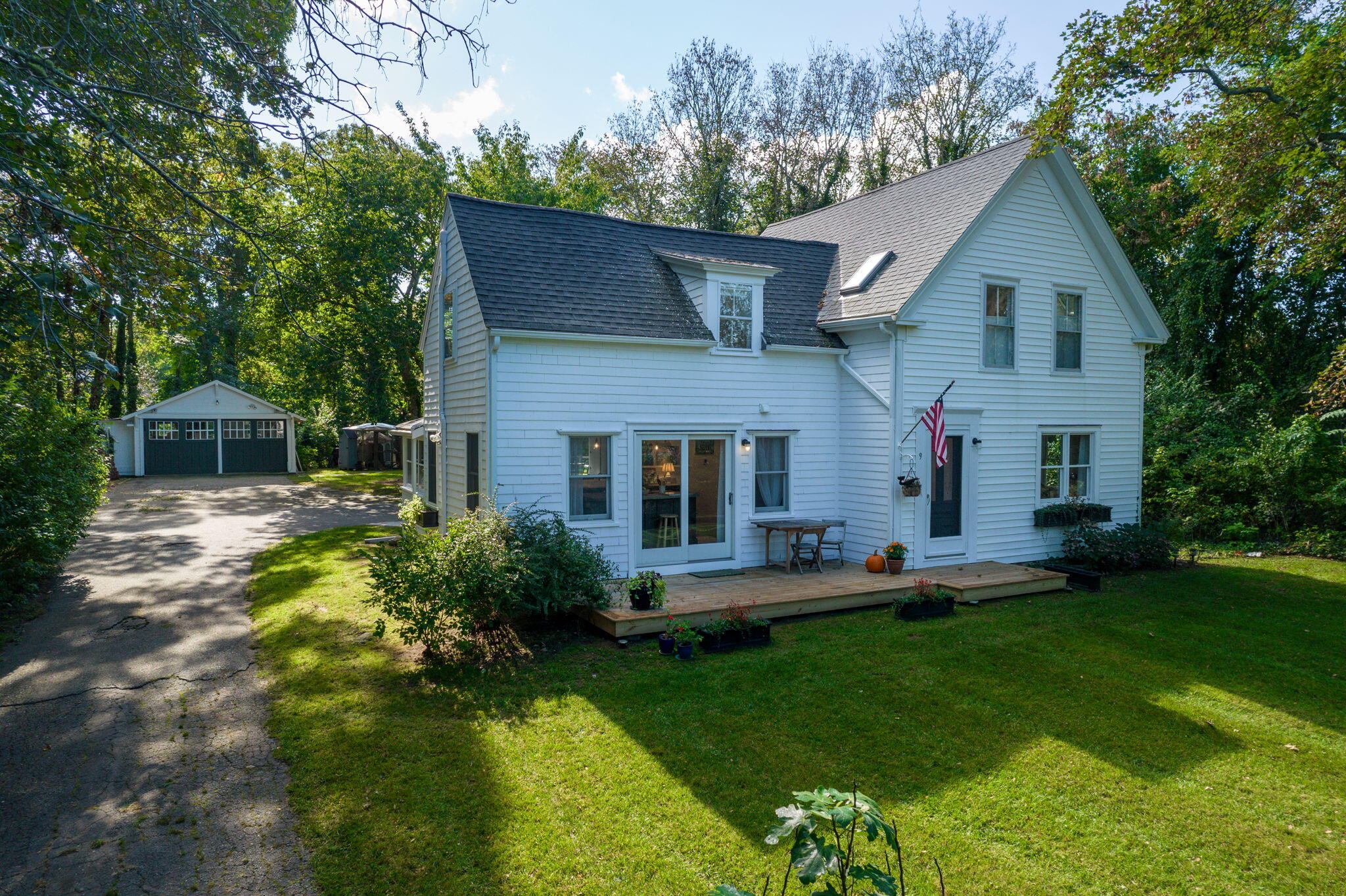 9 Locust Road Orleans, MA 02653 - Photo 35 of 41 a front view of house with yard and green space