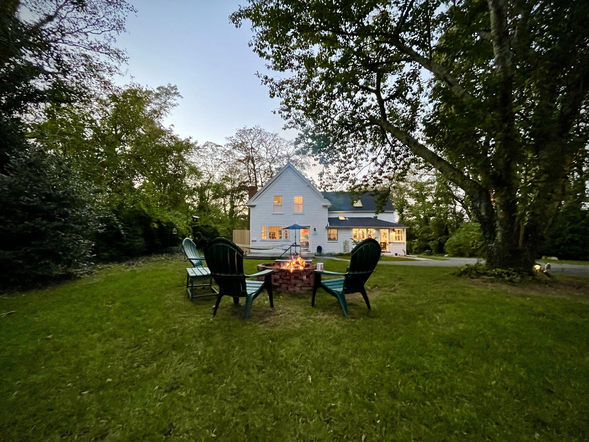 9 Locust Road Orleans, MA 02653 - Photo 39 of 41 a view of a house with backyard and sitting area