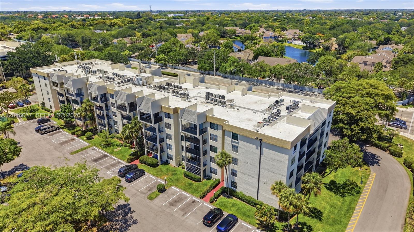 6195 Rock Island Road, Unit 511 Tamarac, FL 33319 - Photo 31 of 31 a view of a city with tall buildings
