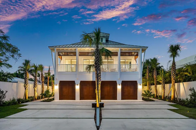 a front view of building with yard