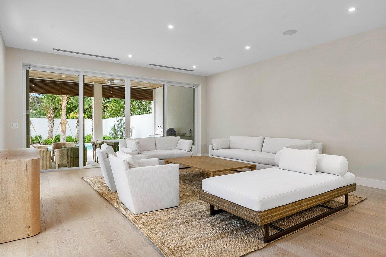909 Bond Way Delray Beach, FL 33483 - Photo 19 of 43 a living room with furniture and a large window