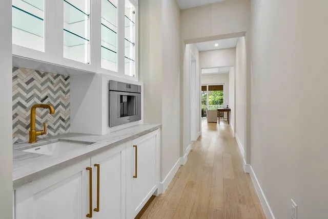 a hallway with cabinets