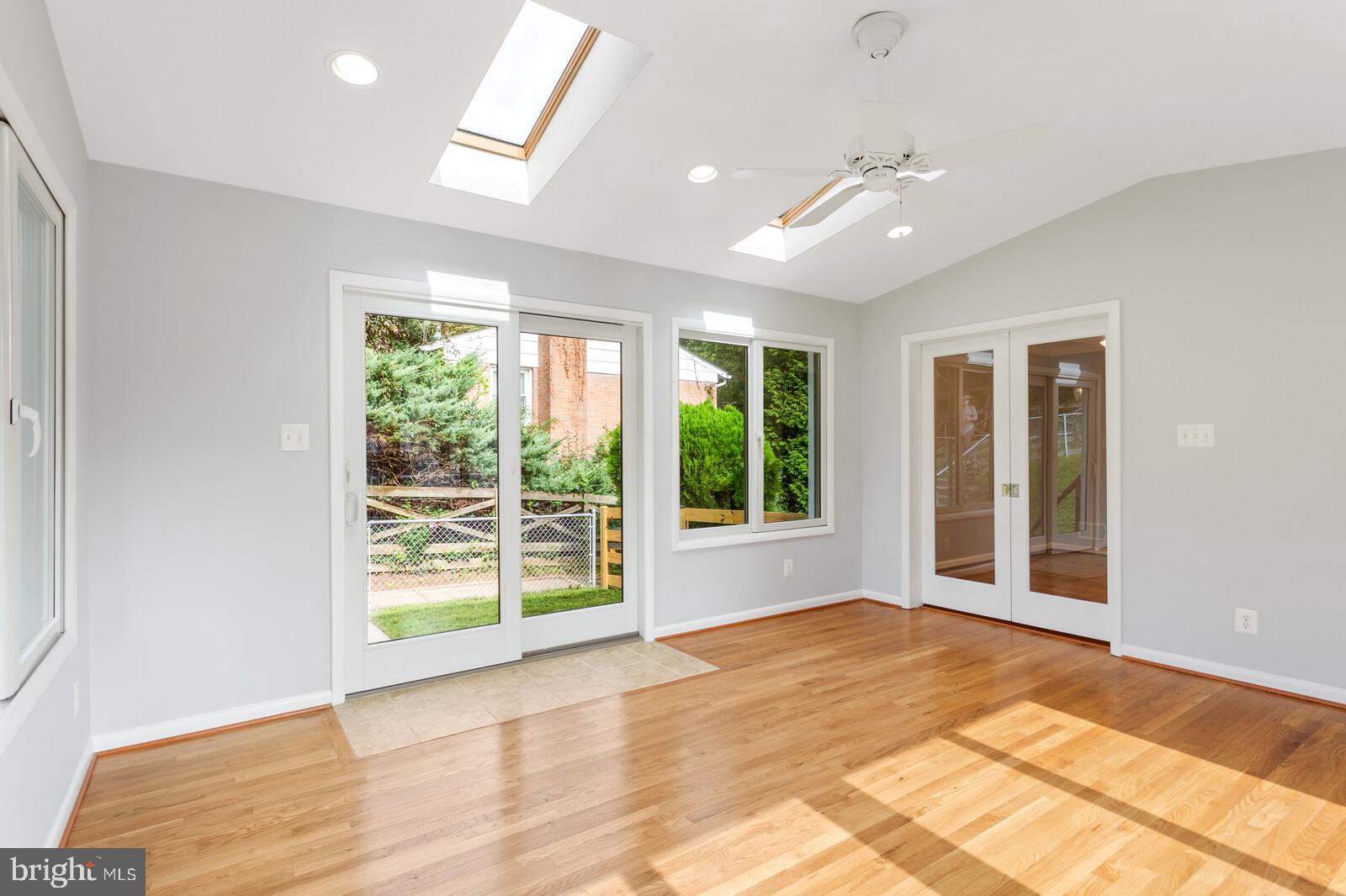 7021 Hadlow Drive Springfield, VA 22152 - Photo 13 of 47 Lovely Skylights & Gleaming Hardwoods in Sunroom