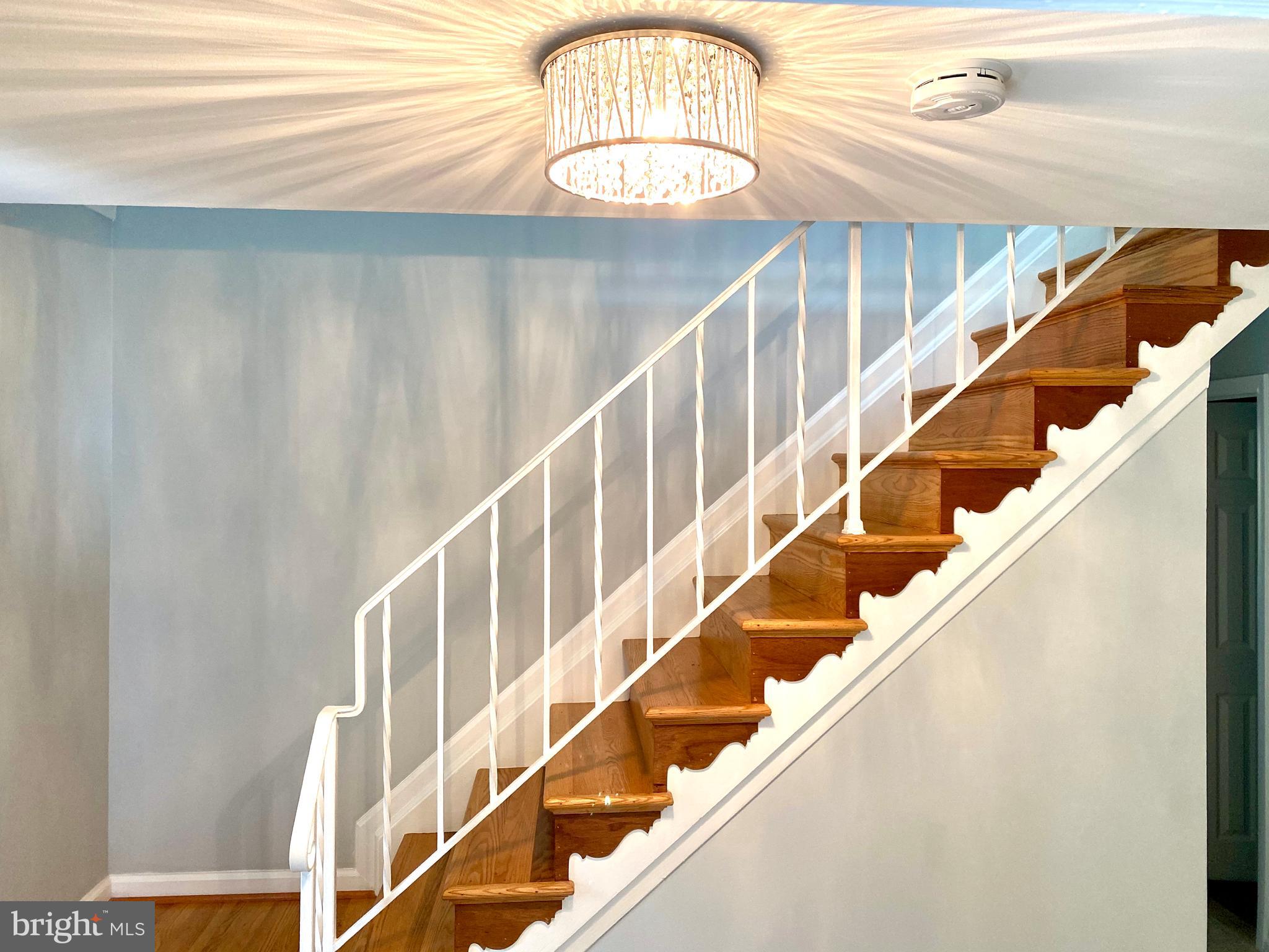 7021 Hadlow Drive Springfield, VA 22152 - Photo 3 of 47 Hardwood Staircase to Upper Level