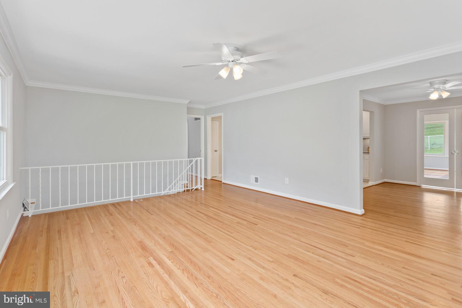 7021 Hadlow Drive Springfield, VA 22152 - Photo 6 of 47 Refinished Hardwood floors Living Room into Dining