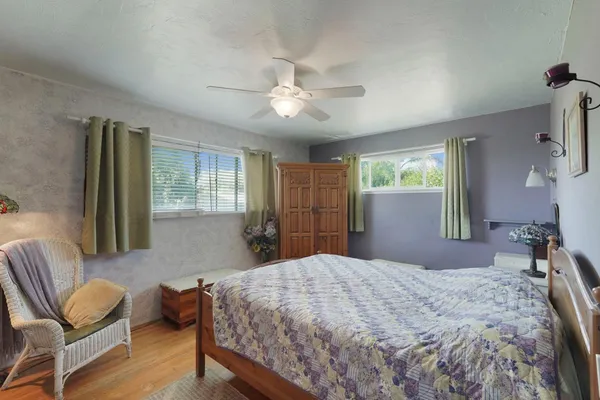 a bedroom with a bed and furniture