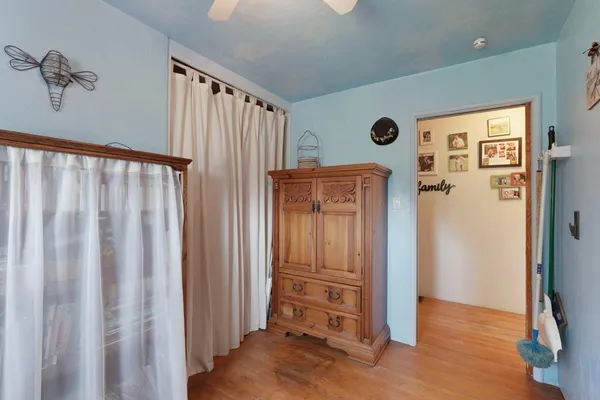 a view of a hallway with closet area