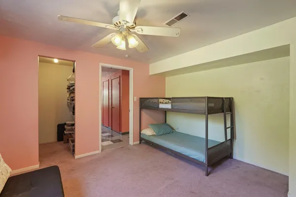 a bedroom with bunk bed