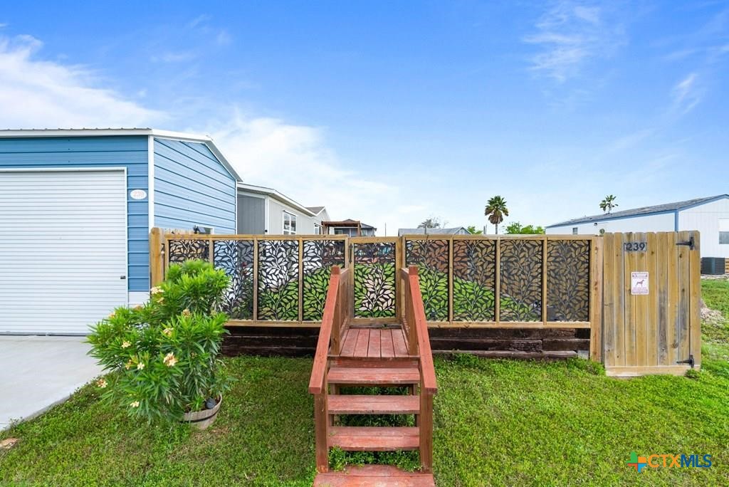 239 Allen M Parks Drive Rockport, TX 78382 - Photo 6 of 29 a view of a house with a yard