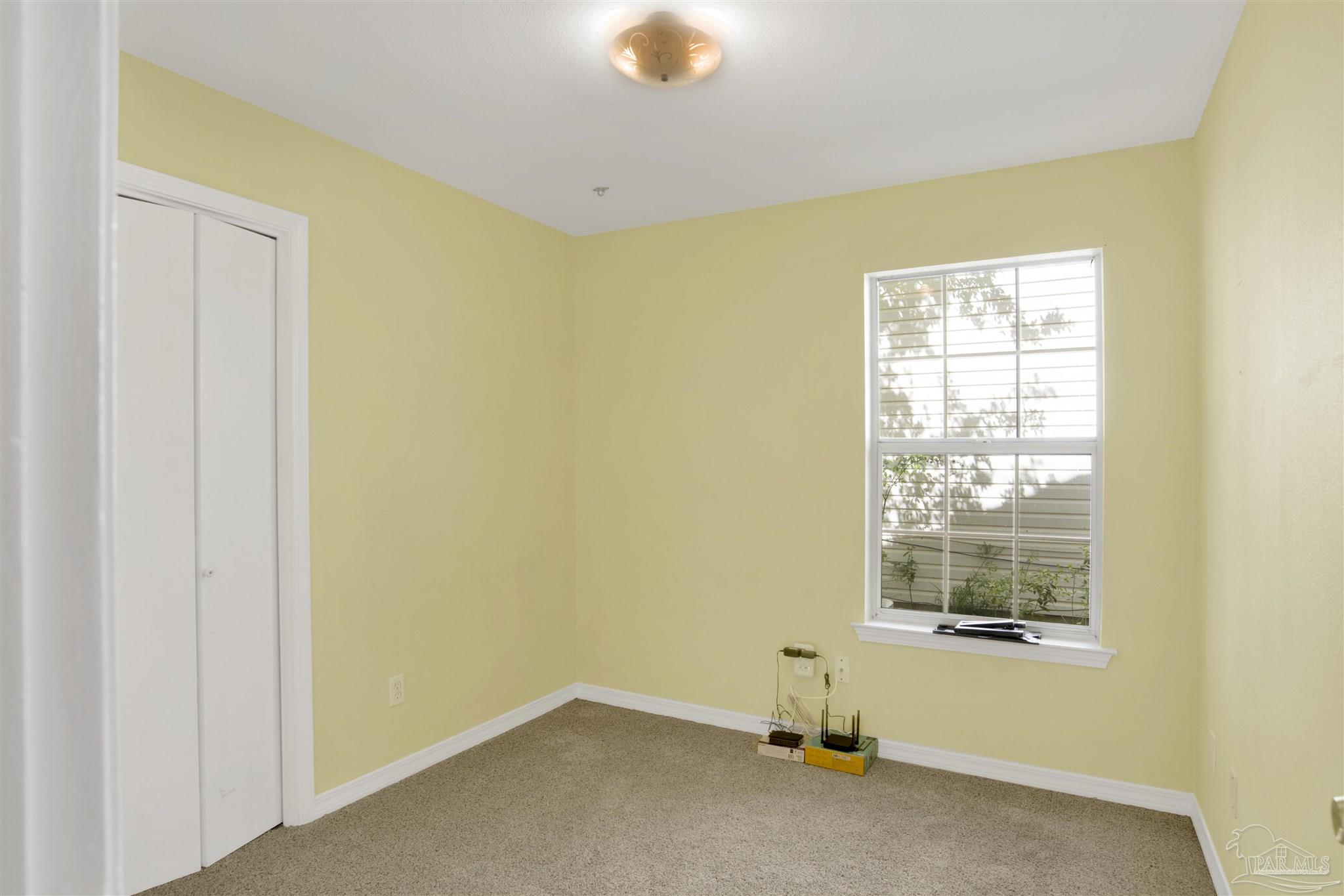 3437 Riverside Drive Pensacola, FL 32514 - Photo 17 of 27 a view of a room with windows