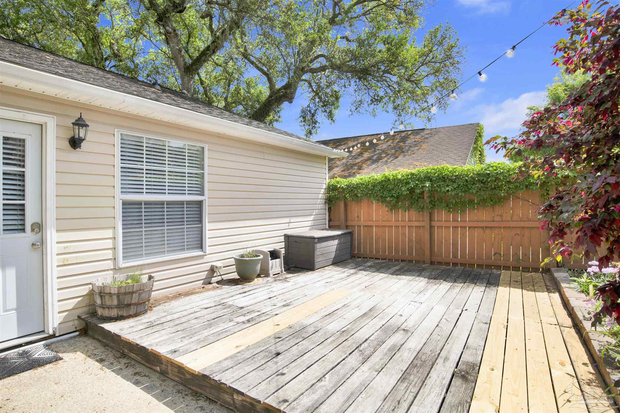 3437 Riverside Drive Pensacola, FL 32514 - Photo 21 of 27 a view of a two chairs on the deck