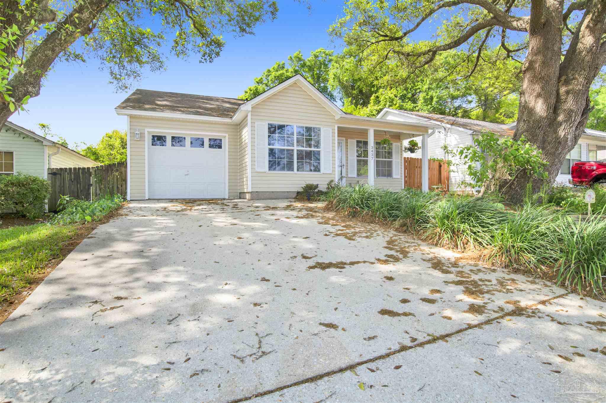 3437 Riverside Drive Pensacola, FL 32514 - Photo 27 of 27 a front view of a house with a yard