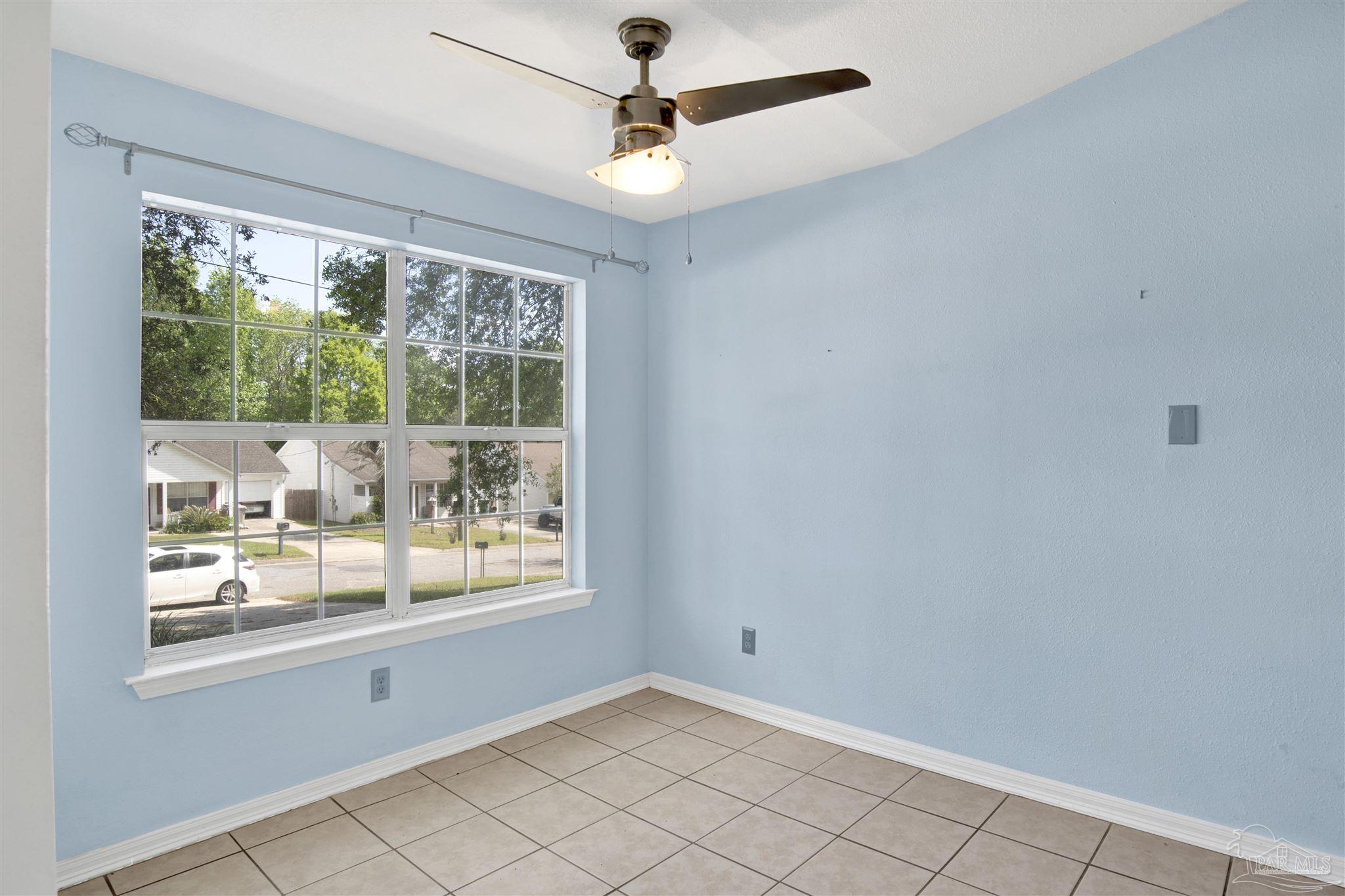 3437 Riverside Drive Pensacola, FL 32514 - Photo 8 of 27 a view of an empty room with a window