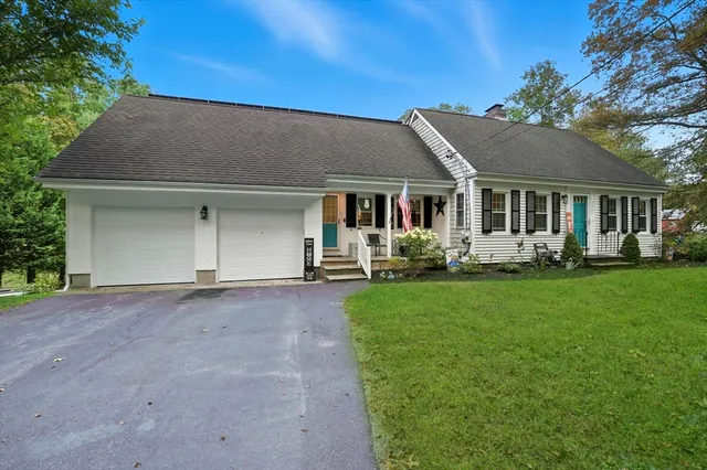 front view of house with a yard