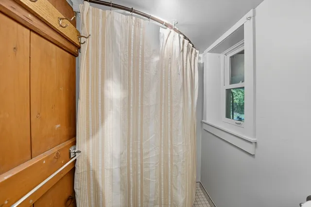 a view of a door and a window