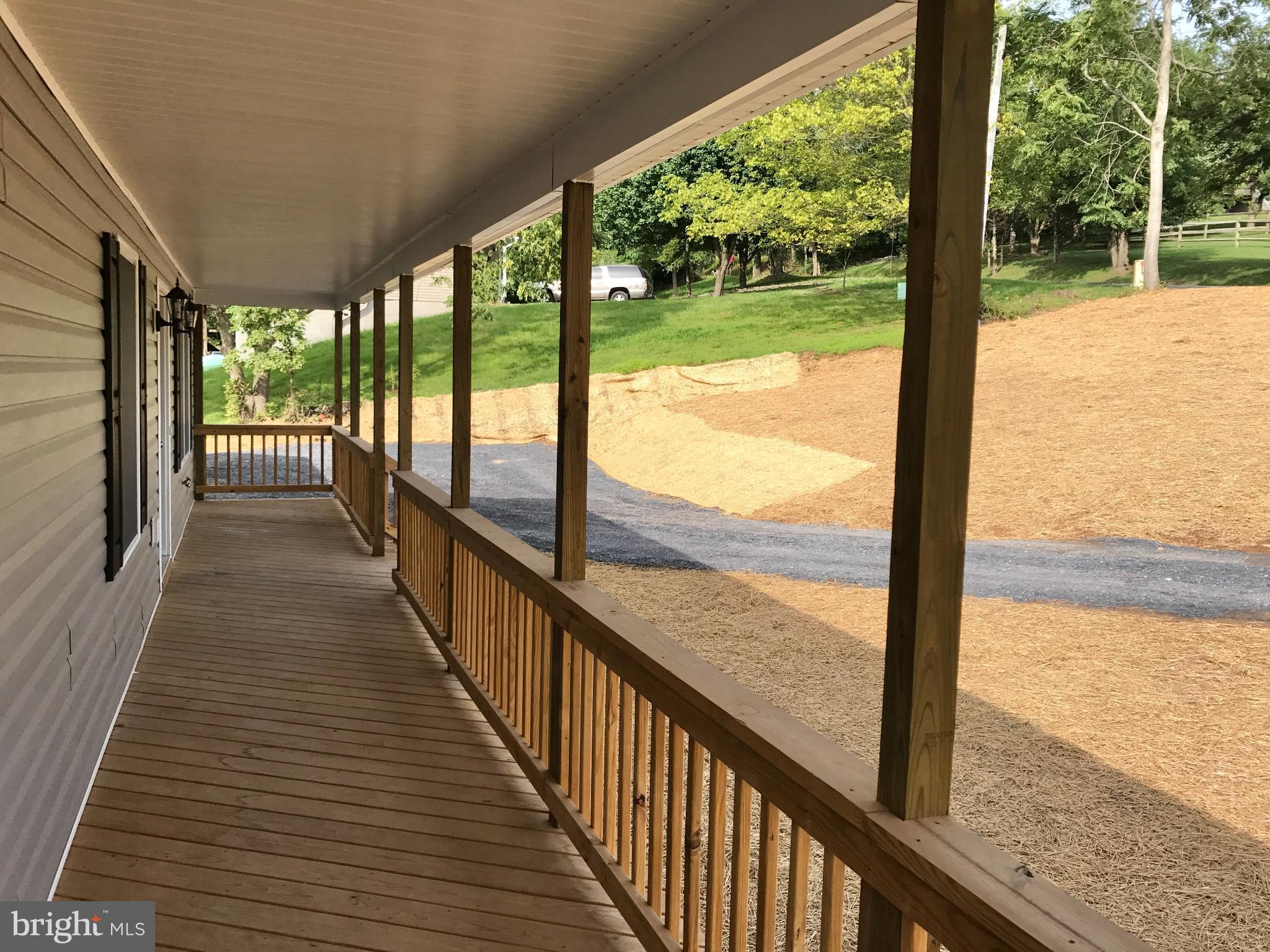 1249 High Top Road Linden, VA 22642 - Photo 32 of 40 Inviting porch with serene landscape views.