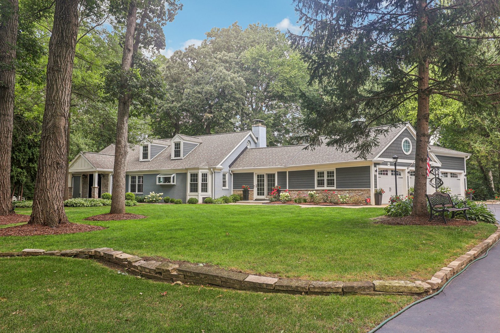 1834 West Palatine Road Palatine, IL 60067 - Photo 1 of 56 a front view of a house with a garden