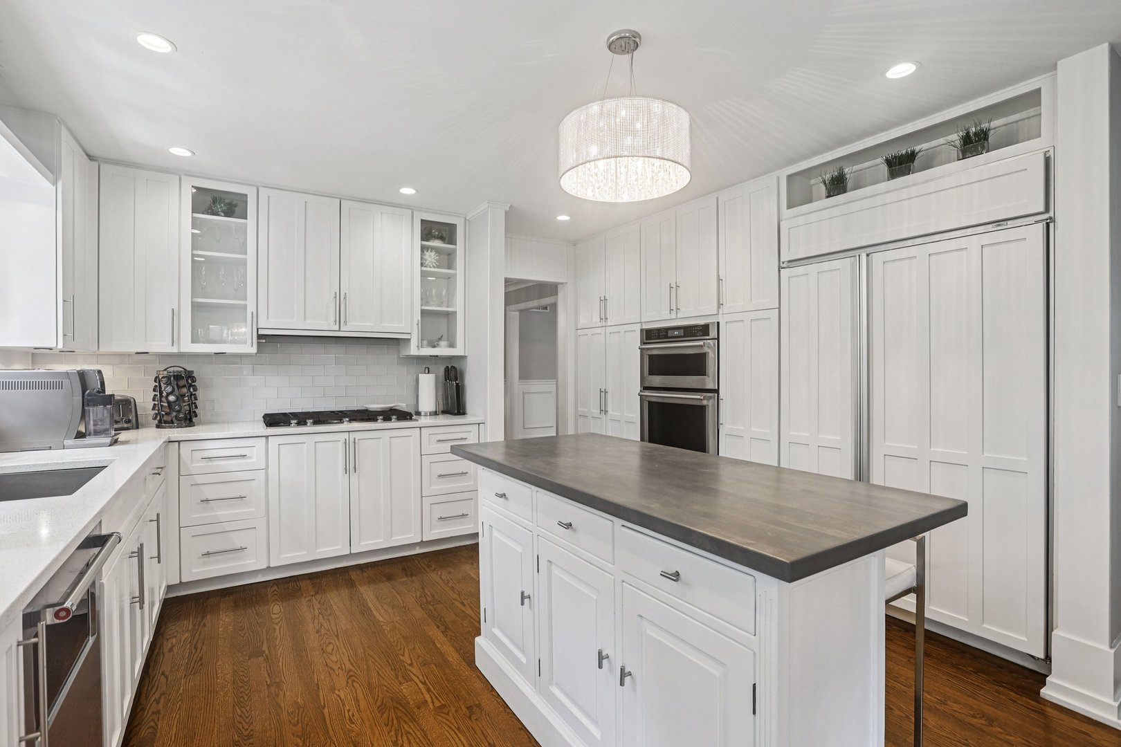 1834 West Palatine Road Palatine, IL 60067 - Photo 12 of 56 a kitchen with stainless steel appliances granite countertop a sink stove and refrigerator