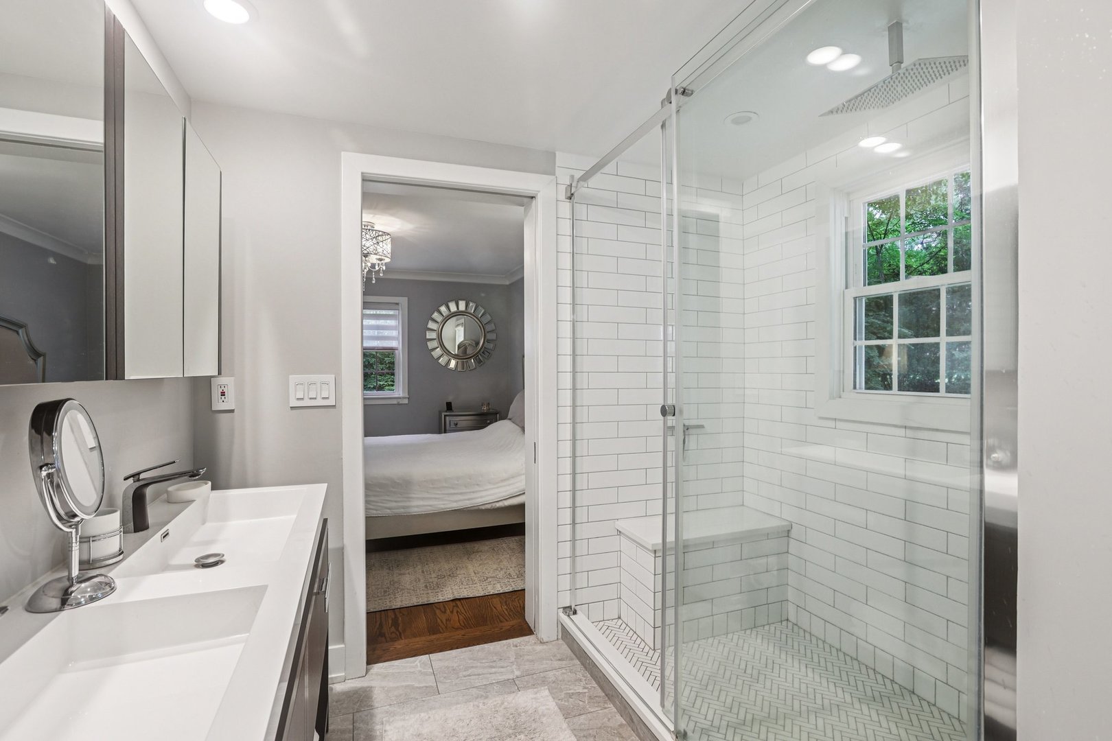 1834 West Palatine Road Palatine, IL 60067 - Photo 19 of 56 a en suite bathroom with a sink a mirror and shower