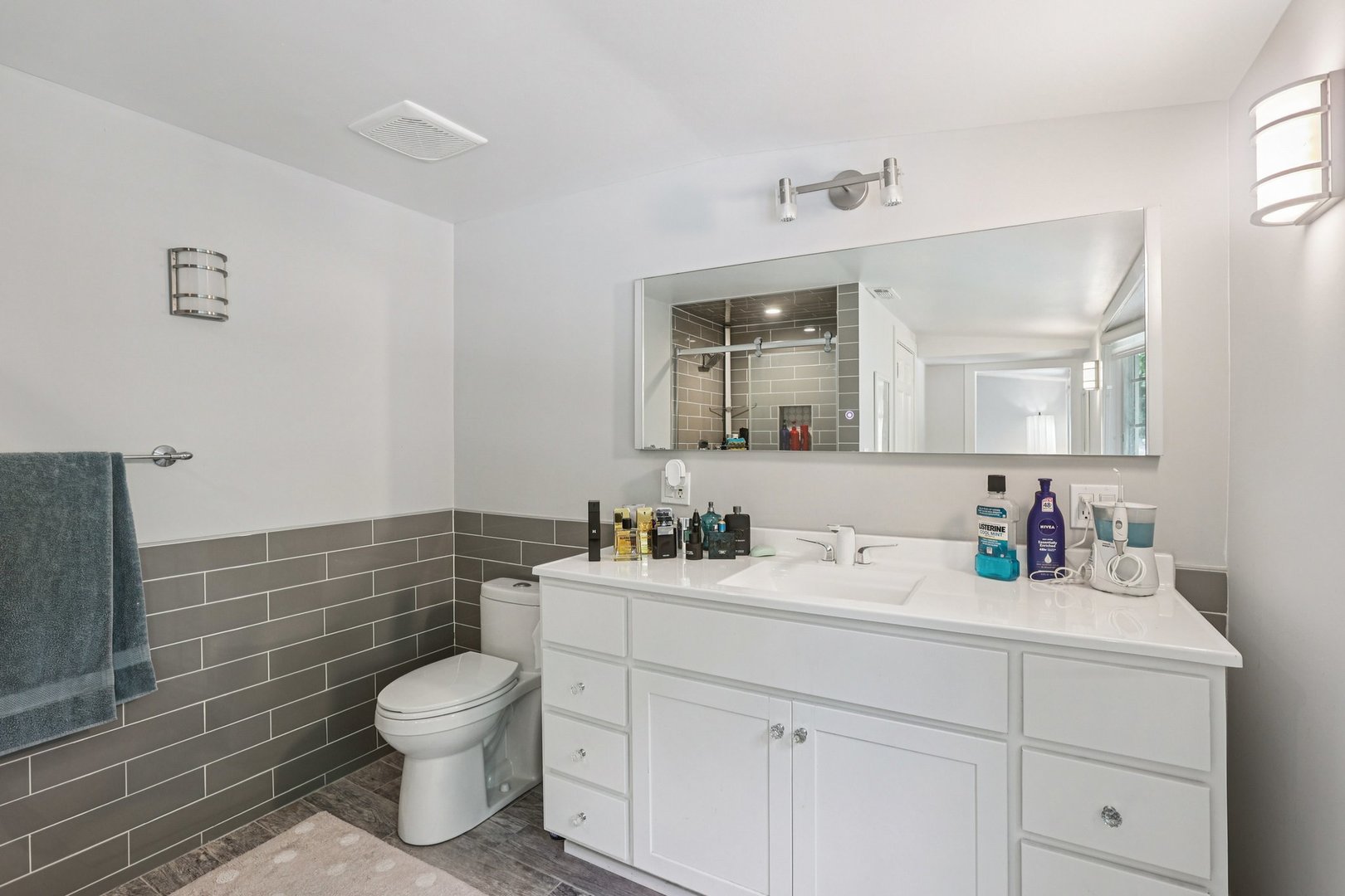 1834 West Palatine Road Palatine, IL 60067 - Photo 25 of 56 a bathroom with a toilet sink and mirror