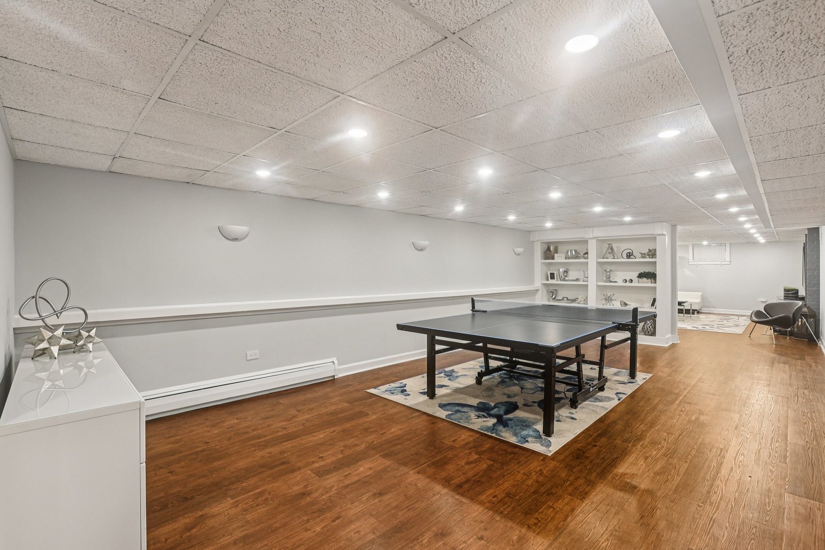 1834 West Palatine Road Palatine, IL 60067 - Photo 34 of 56 a room with furniture and a wooden floor