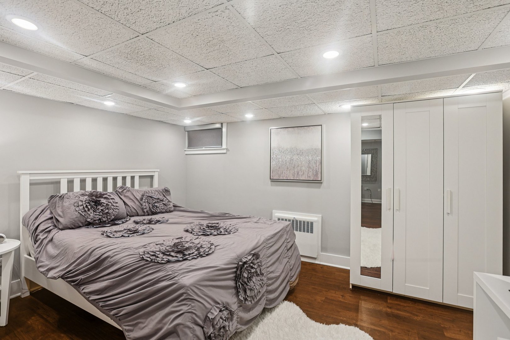1834 West Palatine Road Palatine, IL 60067 - Photo 39 of 56 a large bedroom with a bed and wooden floor