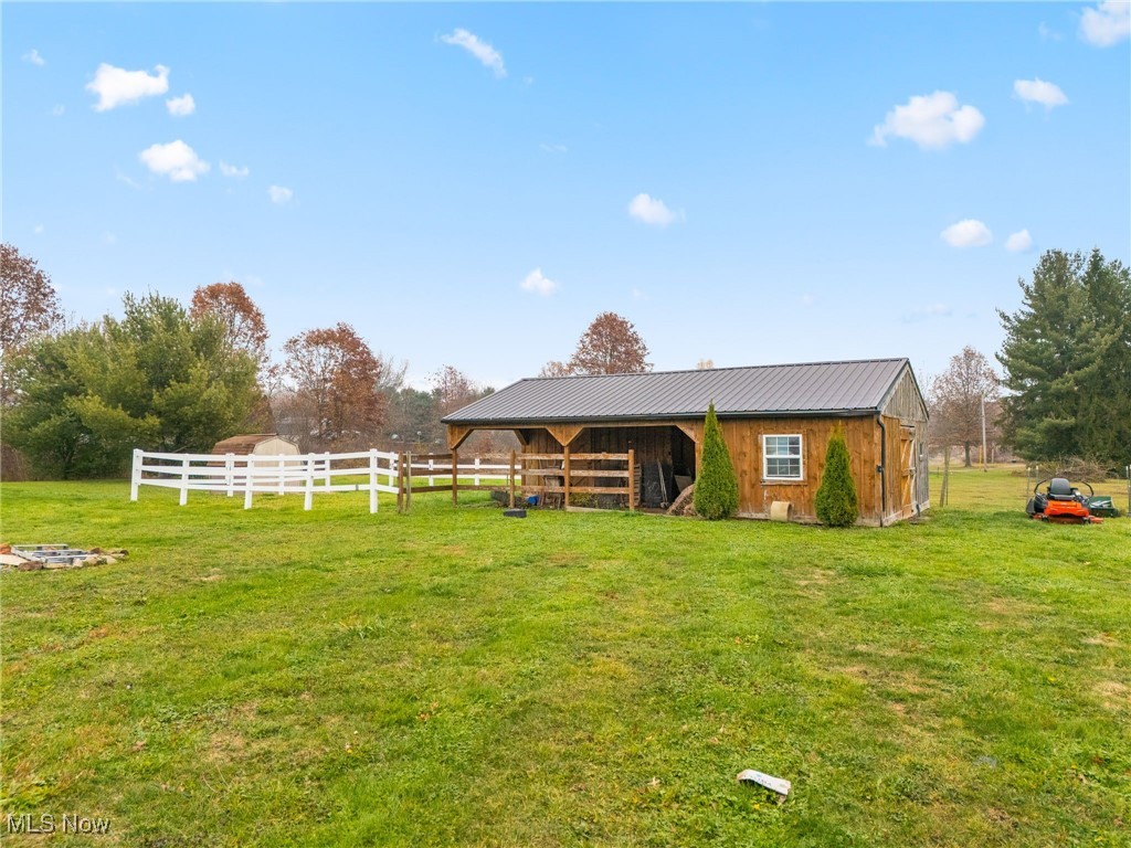 7374 Virginia Road Atwater, OH 44201 - Photo 41 of 49 View of yard with an outbuilding and an exterior structure