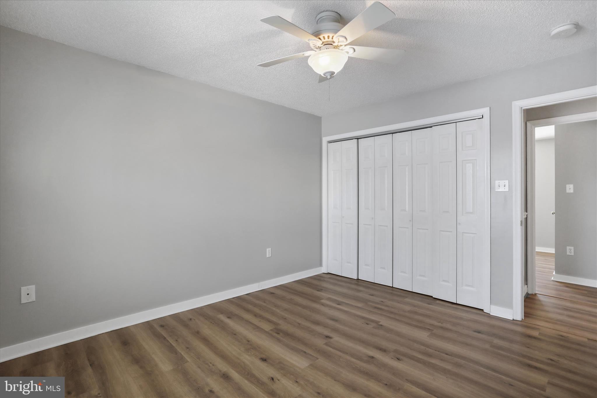 137 Woodrow Road Winchester, VA 22602 - Photo 11 of 45 a view of empty room with wooden floor
