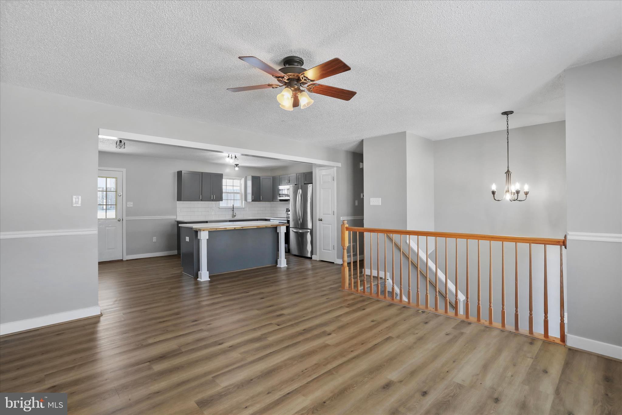 137 Woodrow Road Winchester, VA 22602 - Photo 22 of 45 a view of a kitchen with a sink stainless steel appliances and cabinets