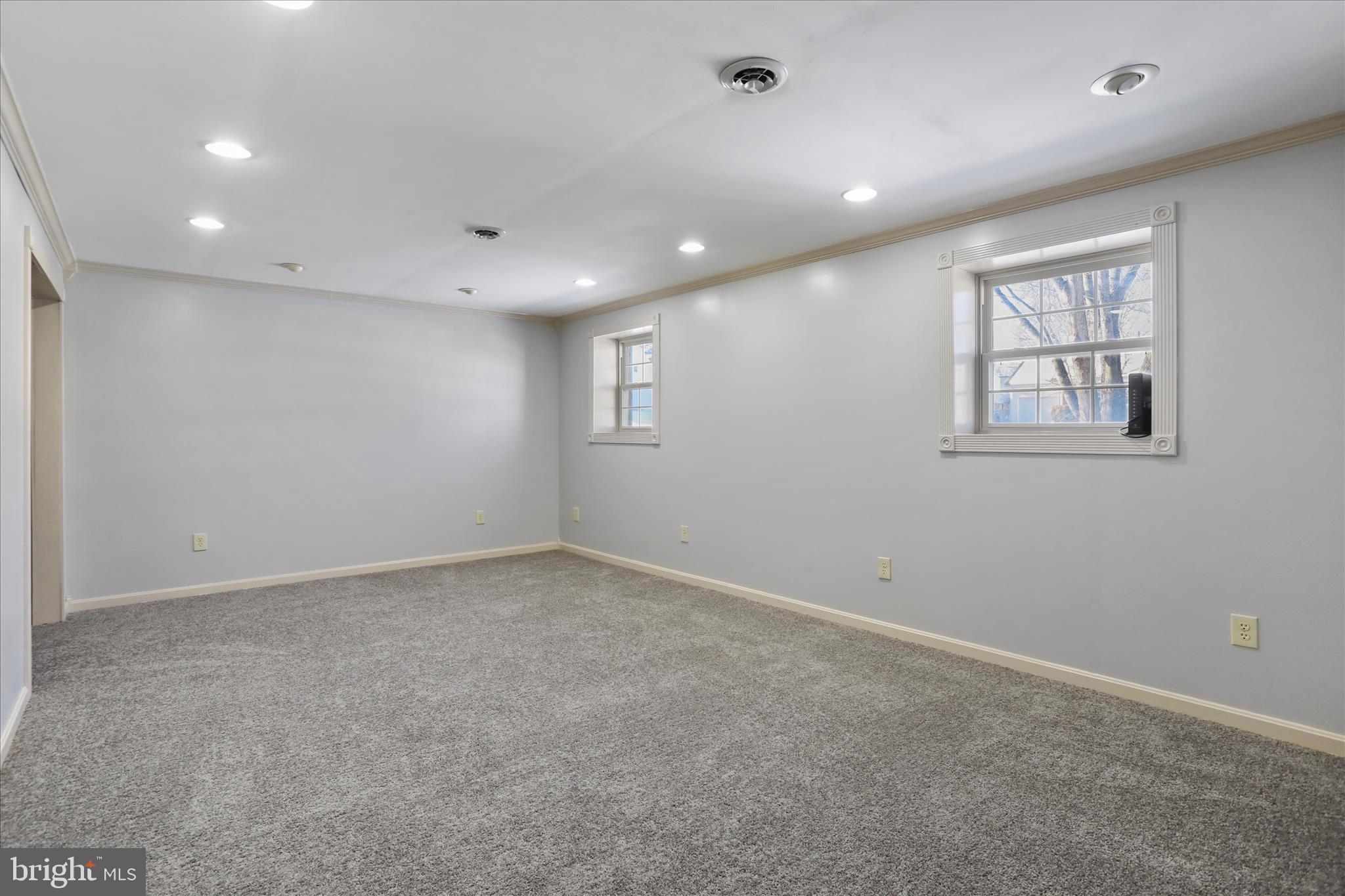 137 Woodrow Road Winchester, VA 22602 - Photo 26 of 45 an empty room with windows