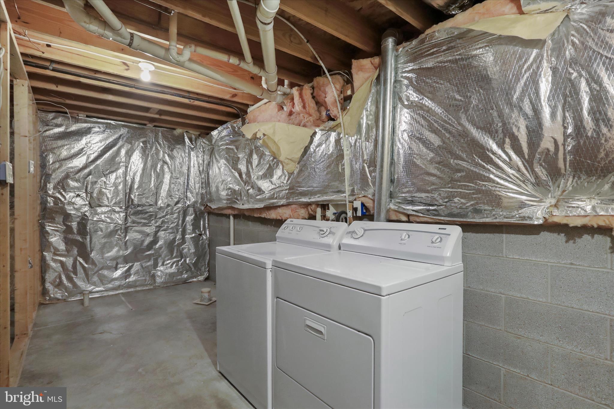 137 Woodrow Road Winchester, VA 22602 - Photo 30 of 45 a utility room with a washer and dryer