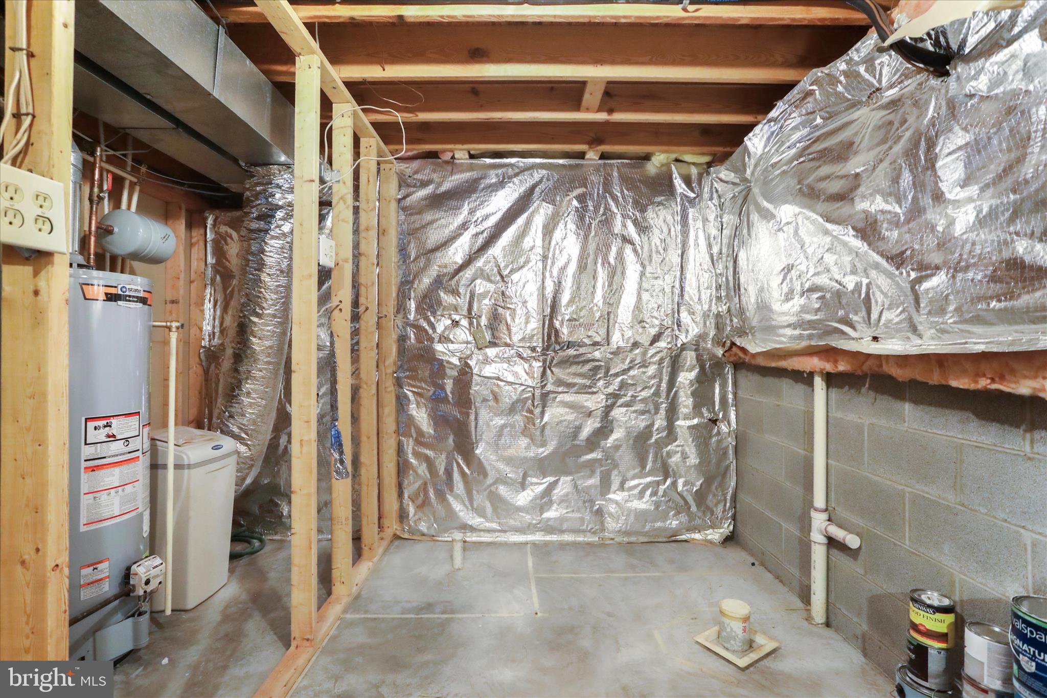 137 Woodrow Road Winchester, VA 22602 - Photo 31 of 45 a view of walk in closet with clothes and shoes