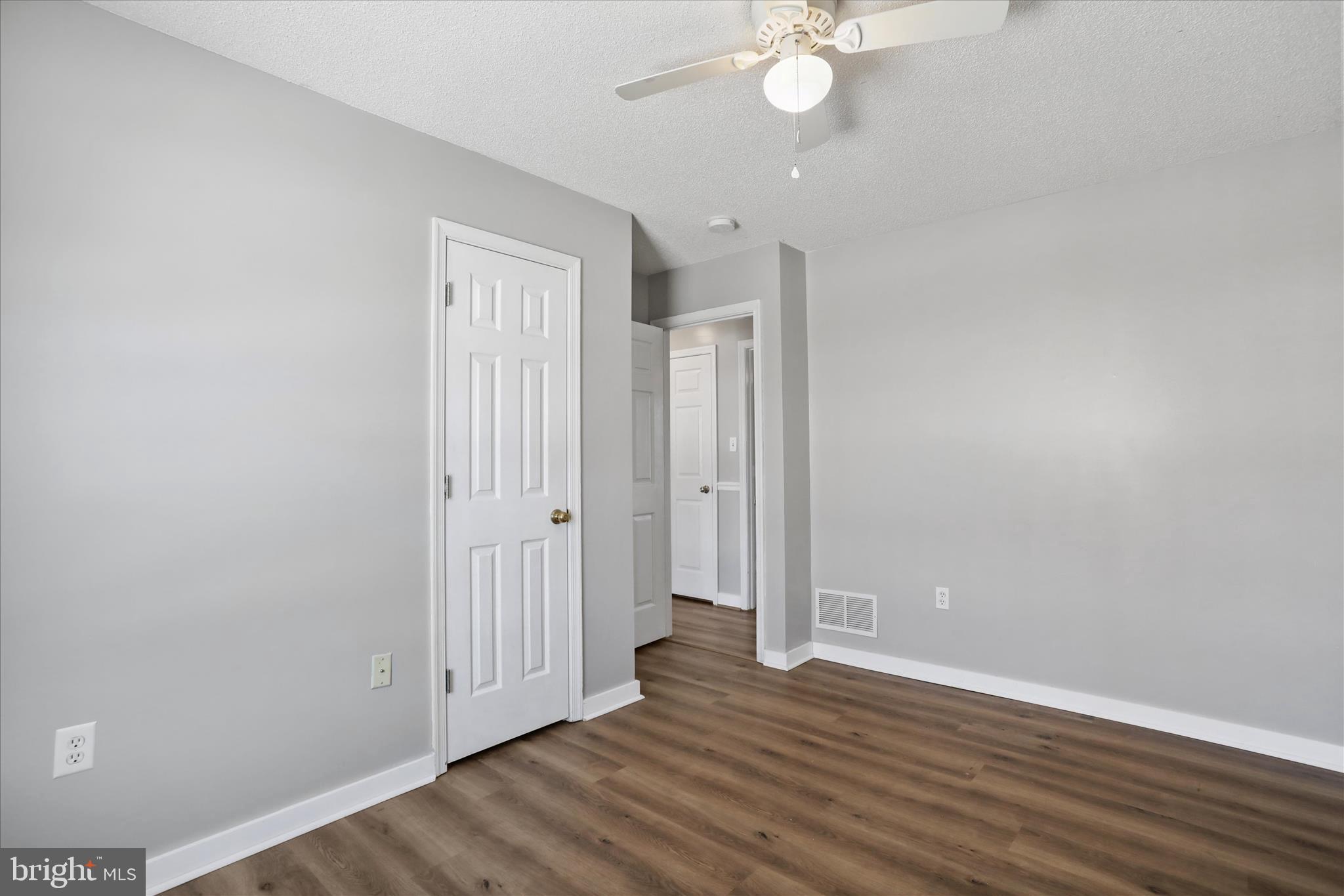 137 Woodrow Road Winchester, VA 22602 - Photo 8 of 45 wooden floor in an empty room