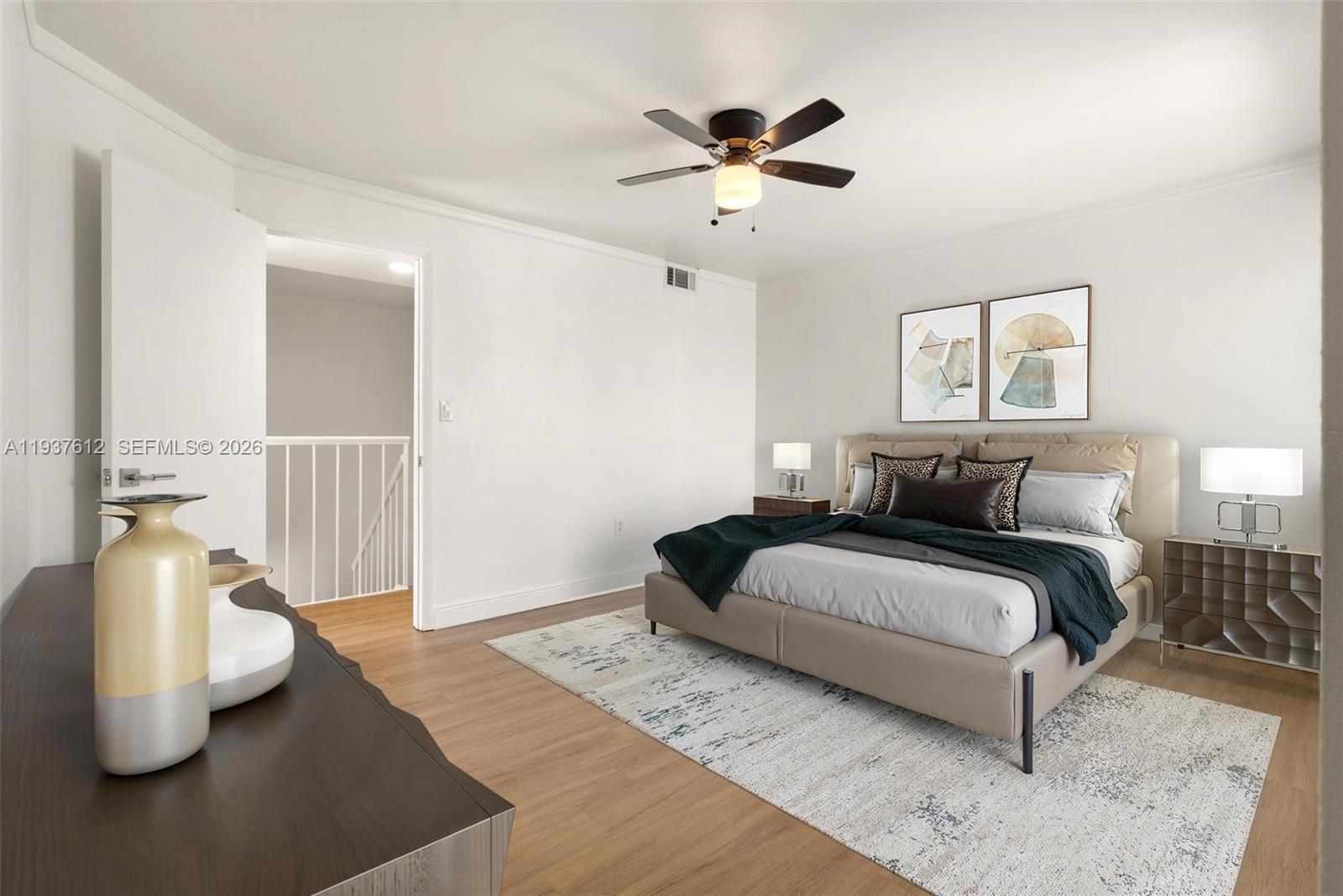 6830 Southwest 45th Lane, Unit 2 Miami, FL 33155 - Photo 12 of 21 a bedroom with a bed and window