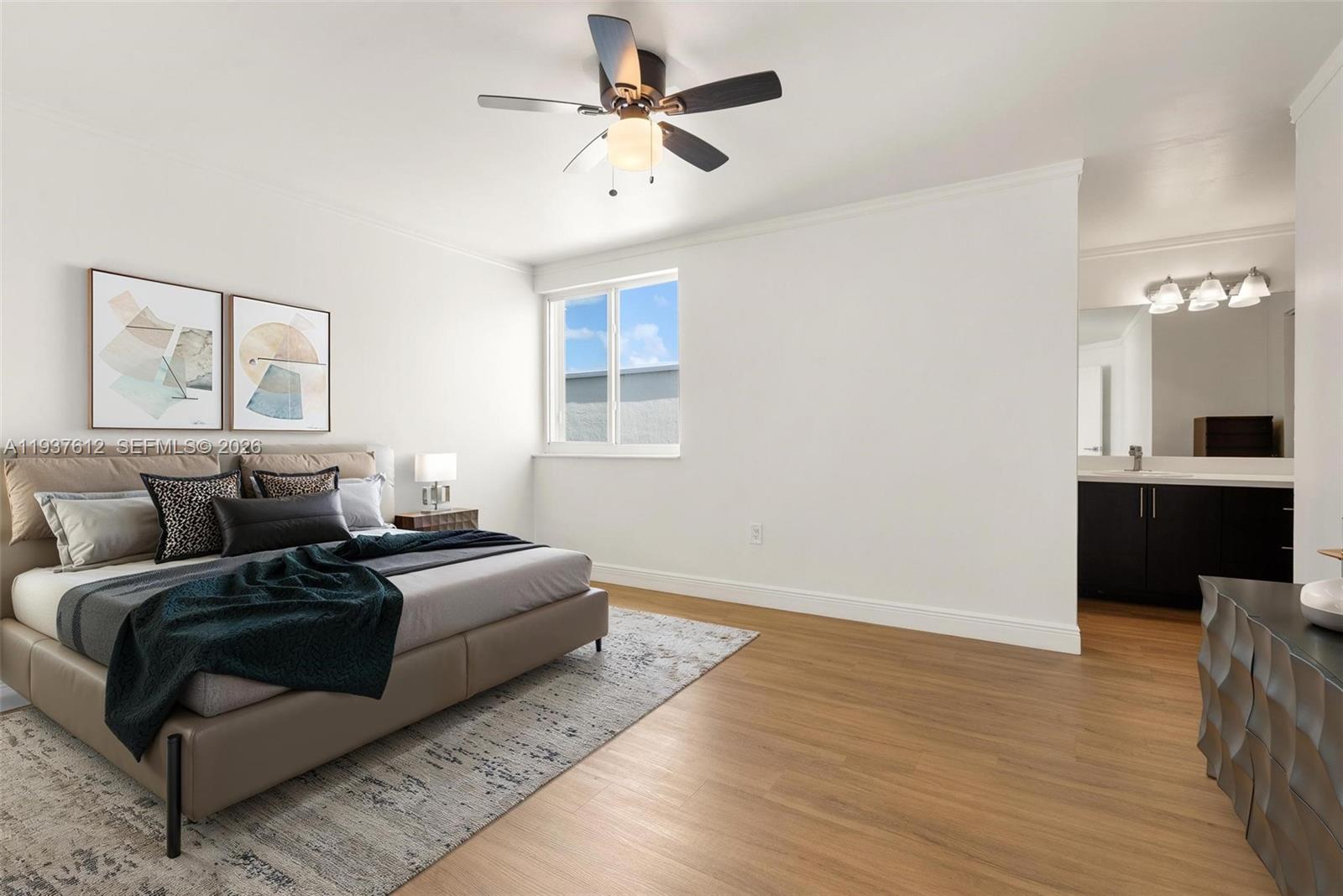 6830 Southwest 45th Lane, Unit 2 Miami, FL 33155 - Photo 7 of 21 a living room with furniture and a chandelier