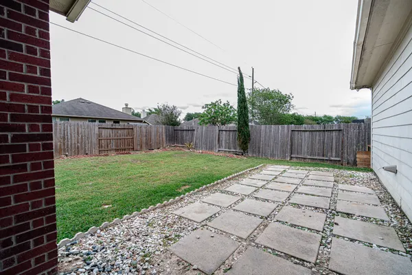 a view of a backyard with a garden
