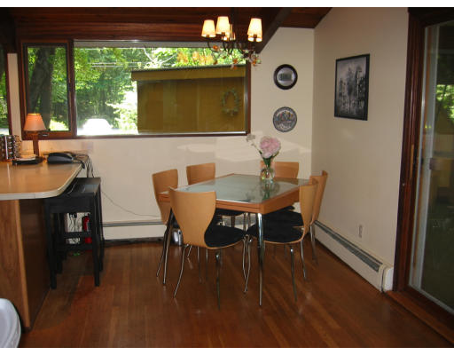 50 Woodside Road Harvard, MA 01451 - Photo 3 of 13 a view of a dining room with furniture and a window