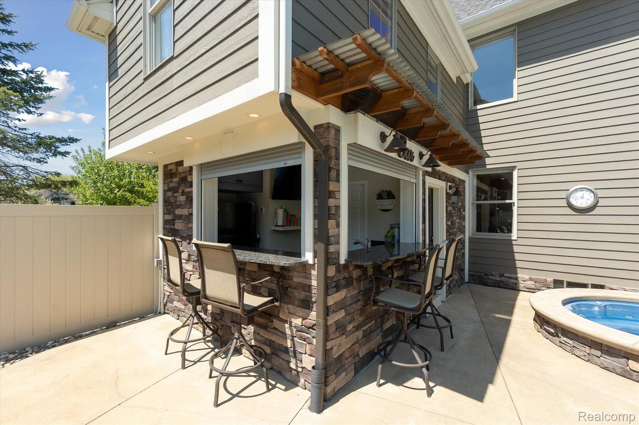 218 Locust Point Howell, MI 48843 - Photo 46 of 59 Cabana/Bar With Roll Up Windows
