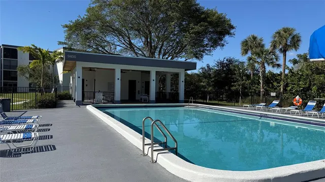 front view of a building with a garden
