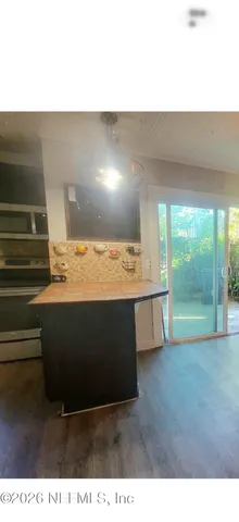 a room with table and chairs