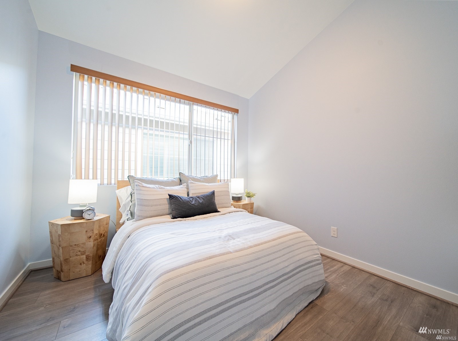 870 Southwest 96th Place Seattle, WA 98106 - Photo 13 of 27 a bedroom with a bed and a window