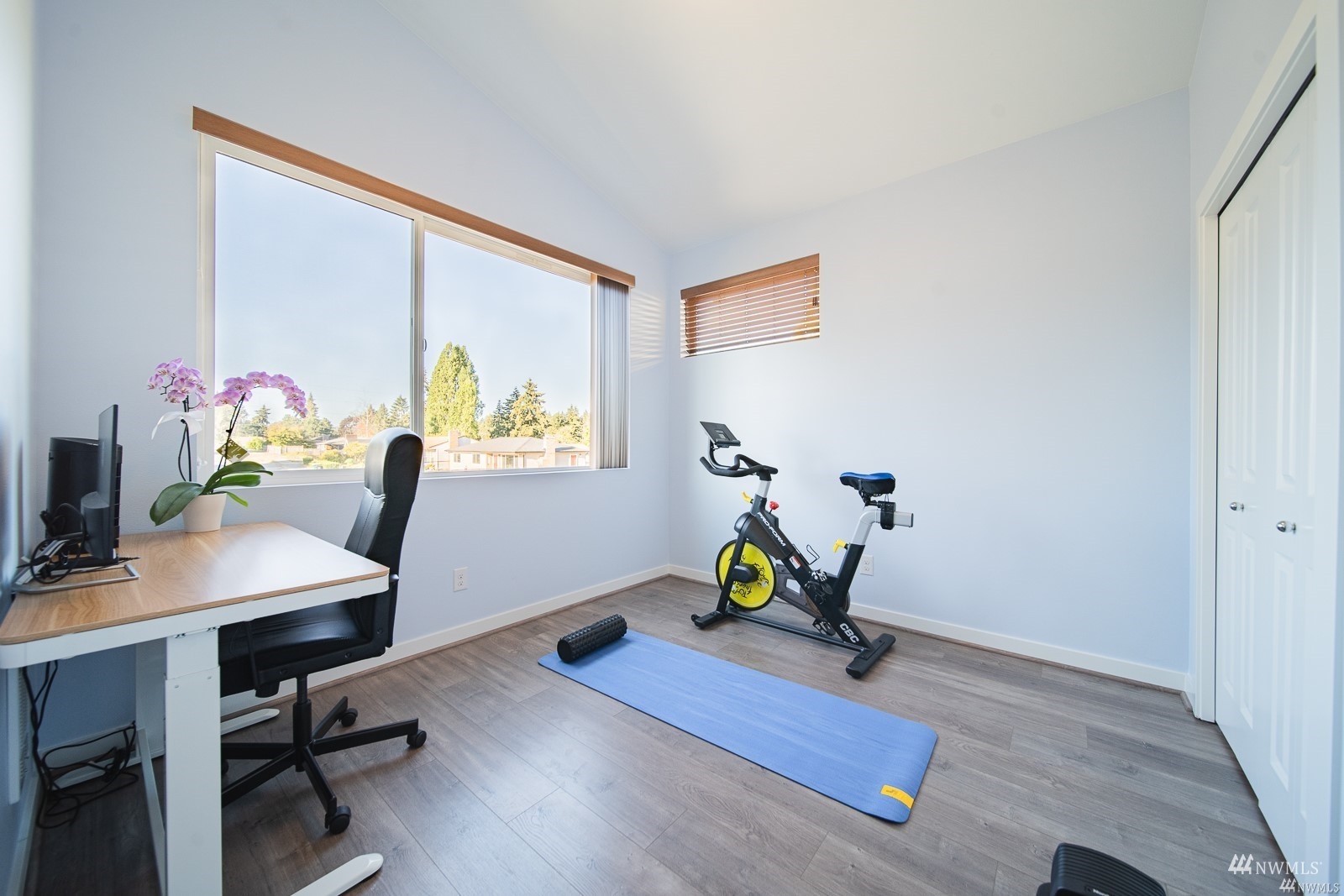 870 Southwest 96th Place Seattle, WA 98106 - Photo 18 of 27 a view of a workspace with furniture and a window