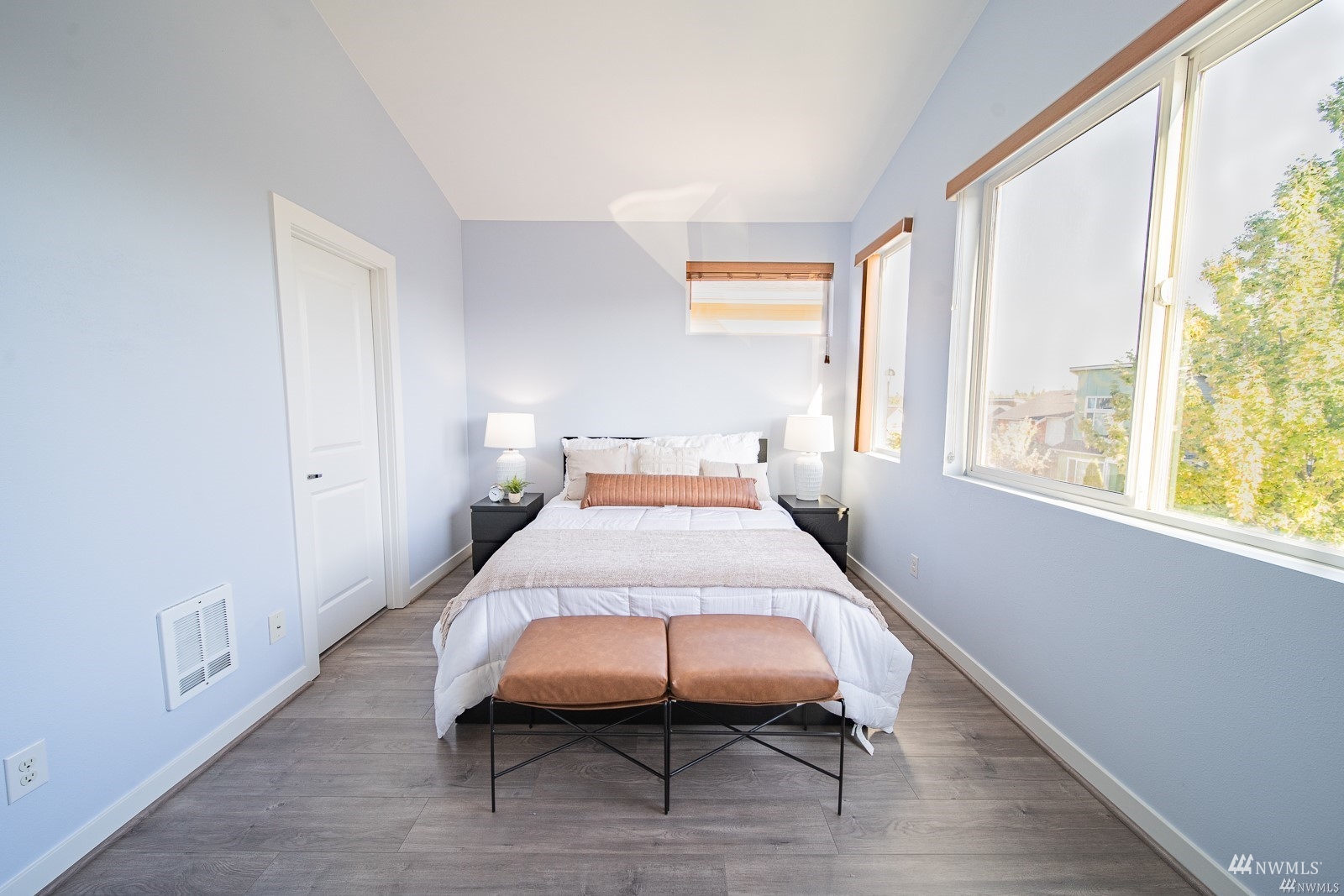 870 Southwest 96th Place Seattle, WA 98106 - Photo 19 of 27 a bedroom with a bed and a window