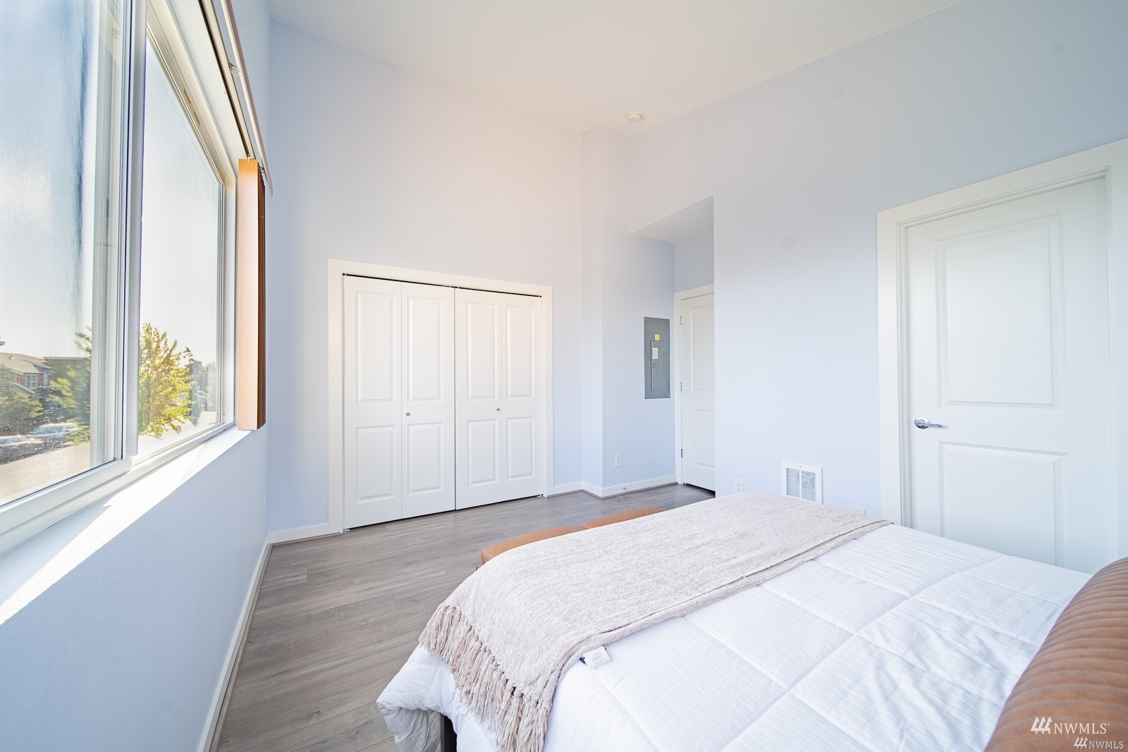 870 Southwest 96th Place Seattle, WA 98106 - Photo 23 of 27 a bedroom with a bed and a large window