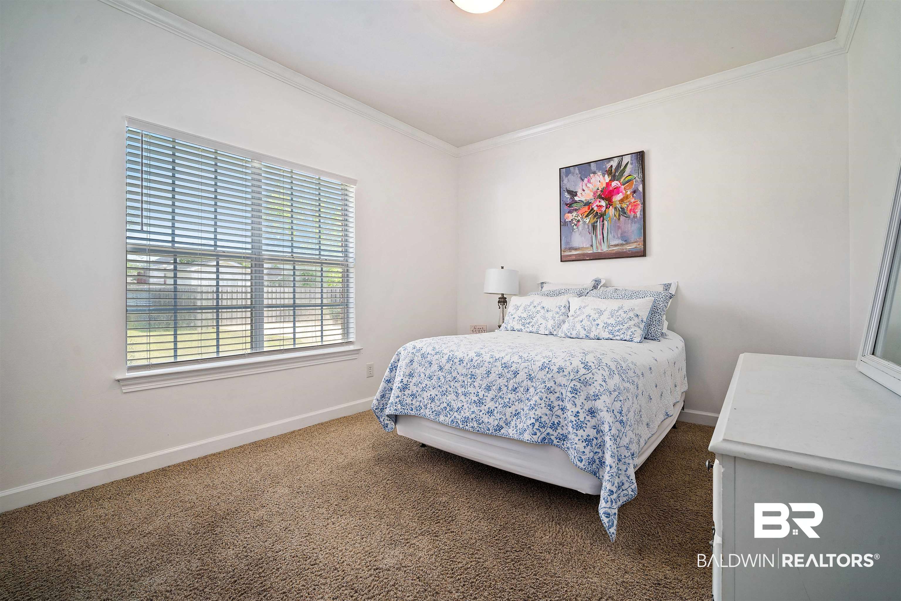 9552 White Castle Road Mobile, AL 36695 - Photo 21 of 31 Bedroom with baseboards, crown molding, and carpet
