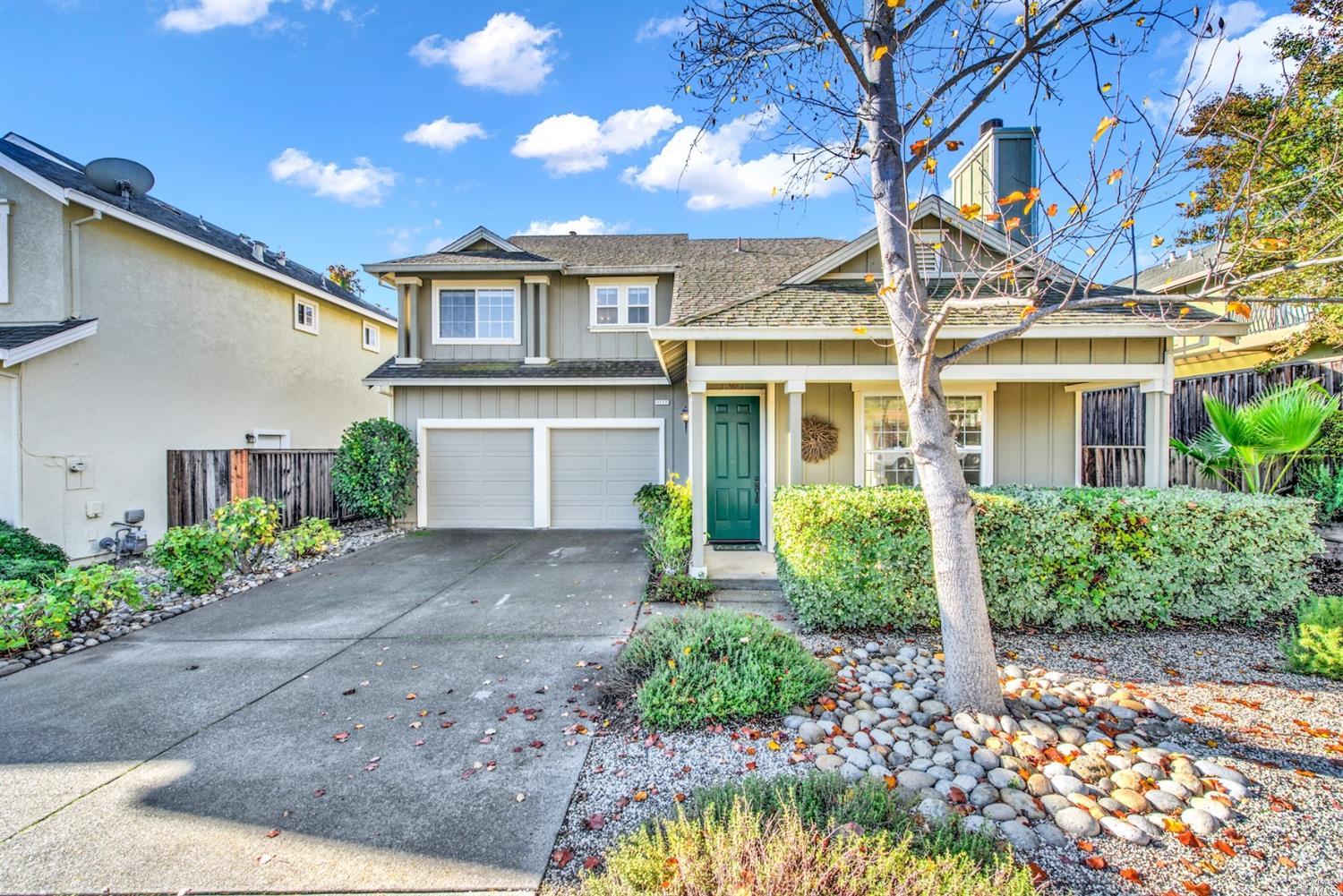 front view of a house with a street